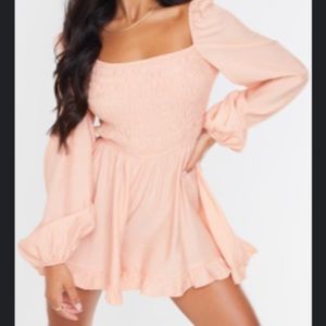 Ruched romper from PrettyLittle Thing.